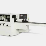 THROUGH FEED AUTOMATIC MOULDER